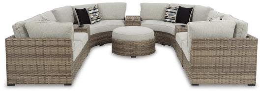 Calworth Outdoor 9-Piece Sectional with Ottoman Rent Wise Rent To Own Jacksonville, Florida