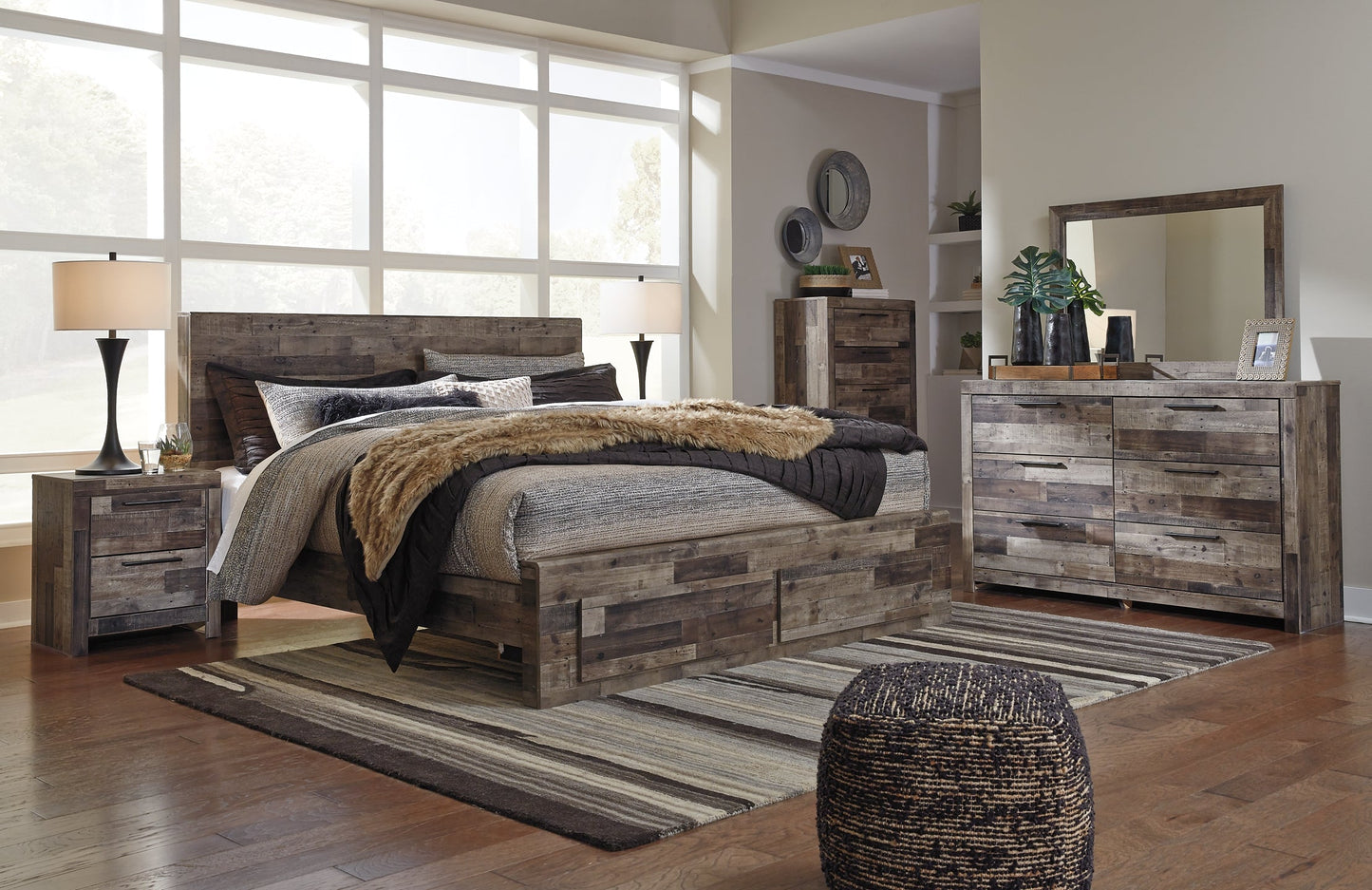 Derekson King Panel Bed with 2 Storage Drawers with Mirrored Dresser, Chest and 2 Nightstands Rent Wise Rent To Own Jacksonville, Florida