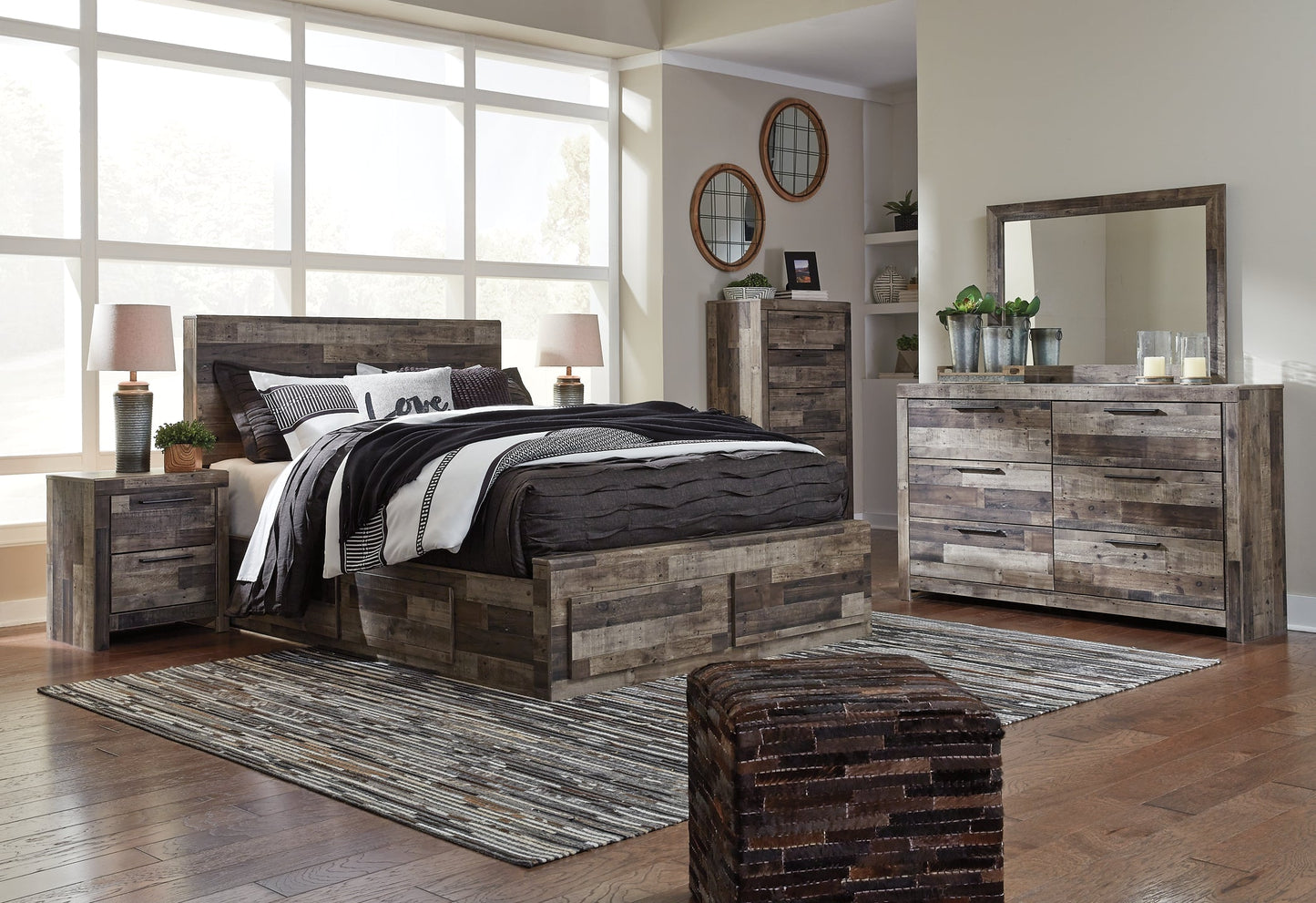 Derekson Queen Panel Bed with 4 Storage Drawers with Mirrored Dresser, Chest and Nightstand Rent Wise Rent To Own Jacksonville, Florida