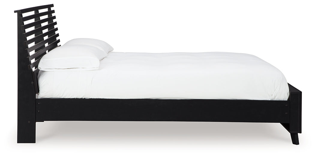 Danziar Panel Bed With Mirrored Dresser