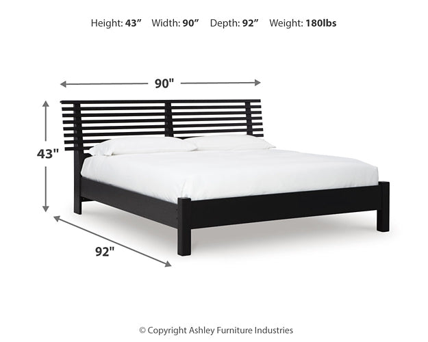 Danziar Panel Bed With Mirrored Dresser