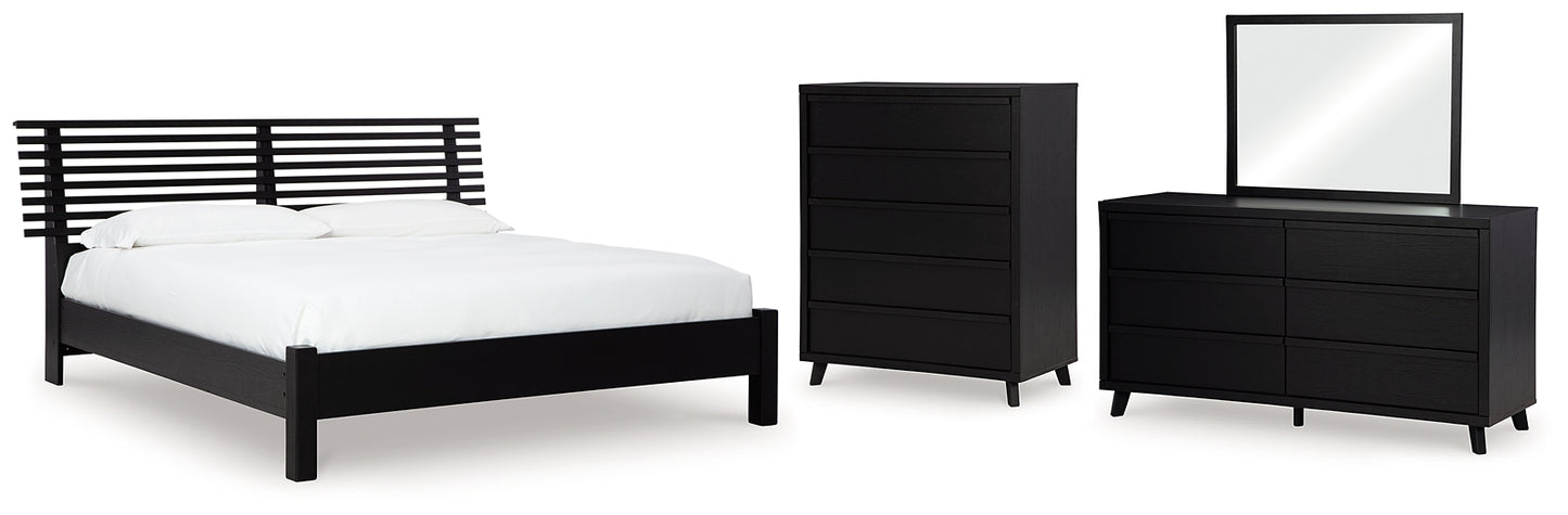 Danziar Panel Bed With Mirrored Dresser And Chest
