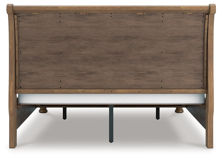 Feddinger Storage Sleigh Bed With Mirrored Dresser And Chest