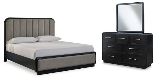 Rowanbeck California Upholstered Panel Bed With Mirrored Dresser