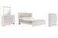 Altyra King Panel Bookcase Bed with Mirrored Dresser and Chest Rent Wise Rent To Own Jacksonville, Florida