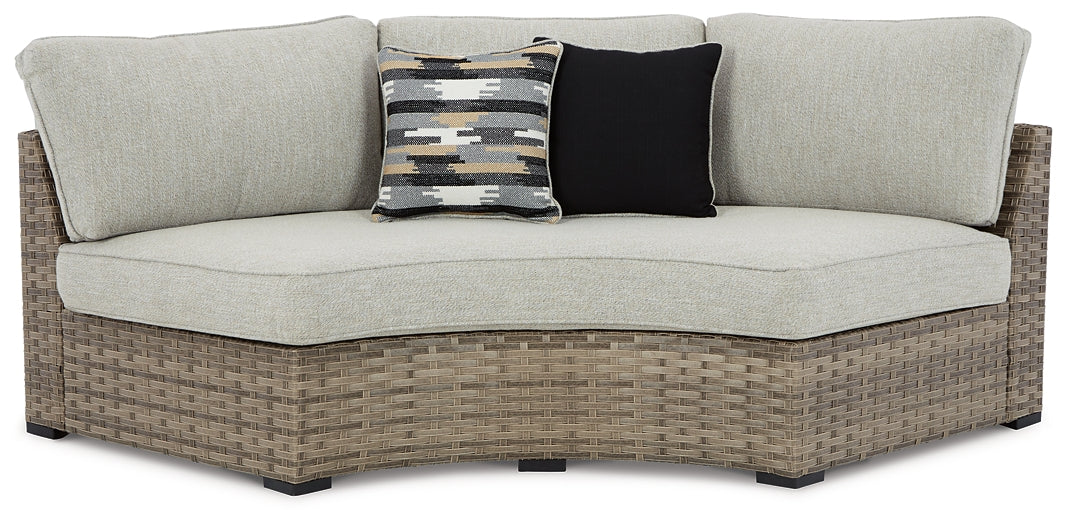 Calworth Curved Loveseat with Cushion Rent Wise Rent To Own Jacksonville, Florida