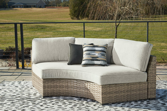 Calworth Curved Loveseat with Cushion Rent Wise Rent To Own Jacksonville, Florida
