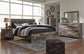 Derekson King Panel Bed with 2 Storage Drawers with Mirrored Dresser, Chest and 2 Nightstands Rent Wise Rent To Own Jacksonville, Florida