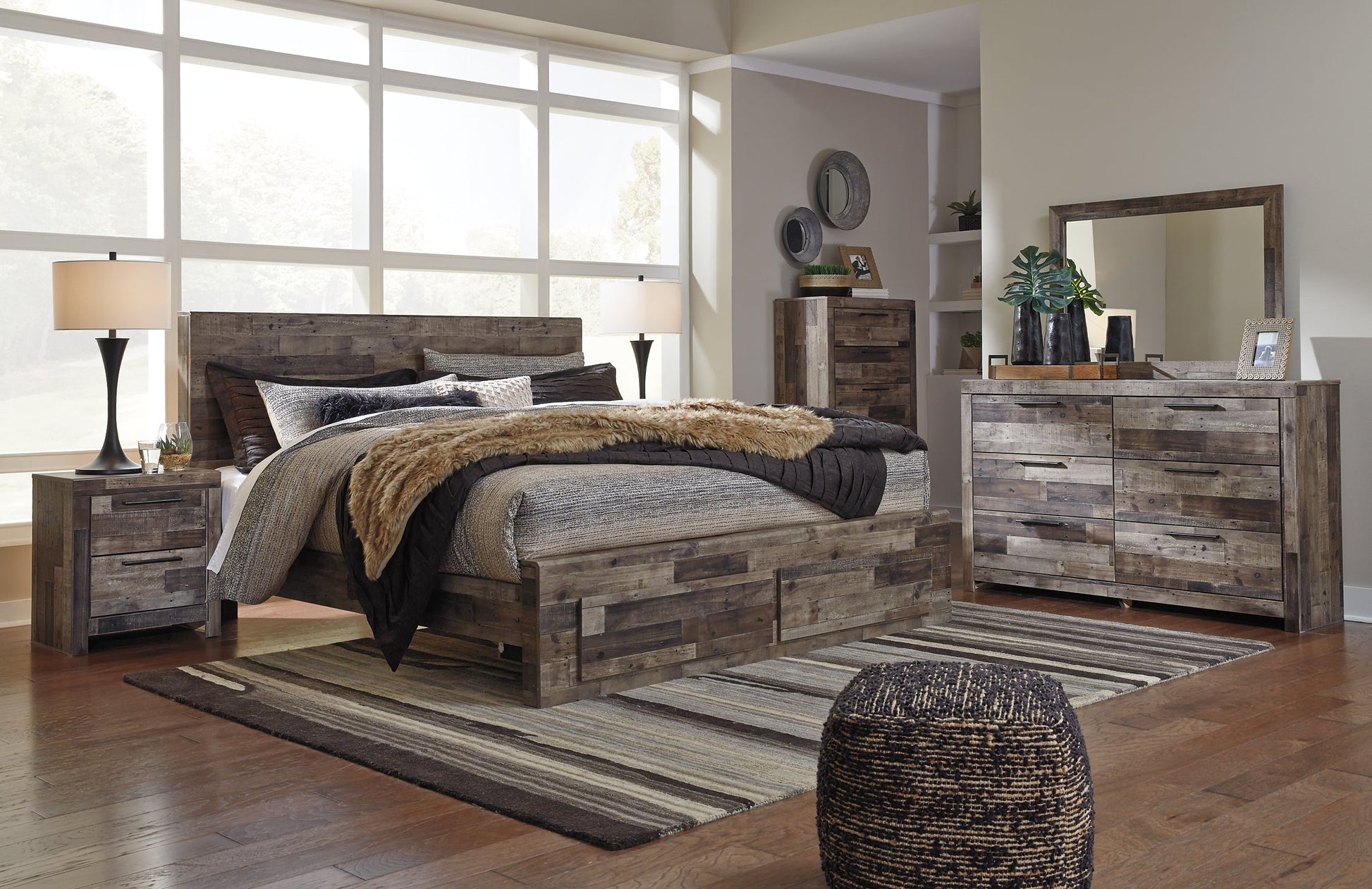 Derekson King Panel Bed with 2 Storage Drawers with Mirrored Dresser, Chest and 2 Nightstands Rent Wise Rent To Own Jacksonville, Florida