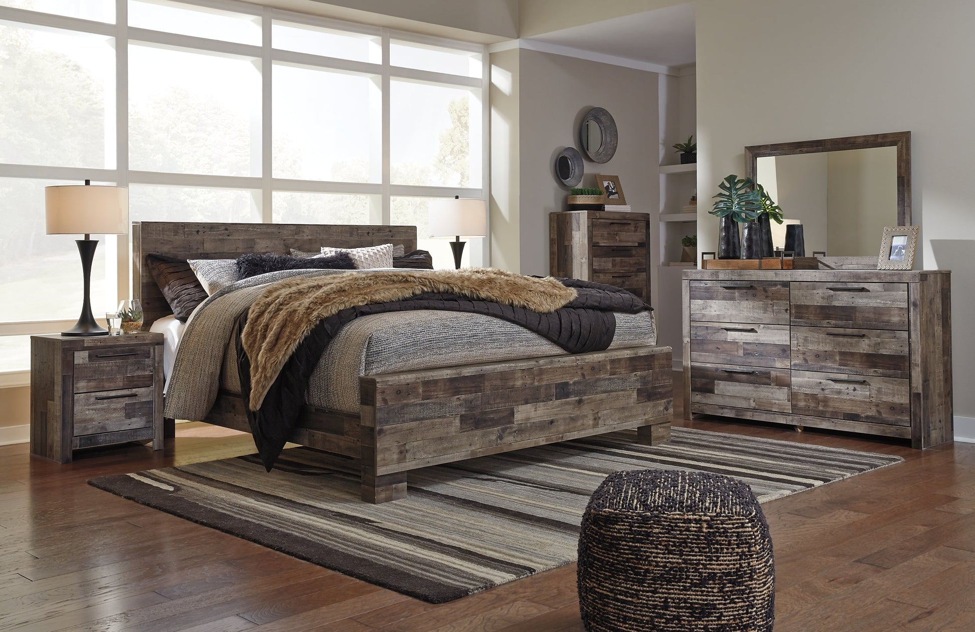 Derekson King Panel Bed with Mirrored Dresser, Chest and Nightstand Rent Wise Rent To Own Jacksonville, Florida