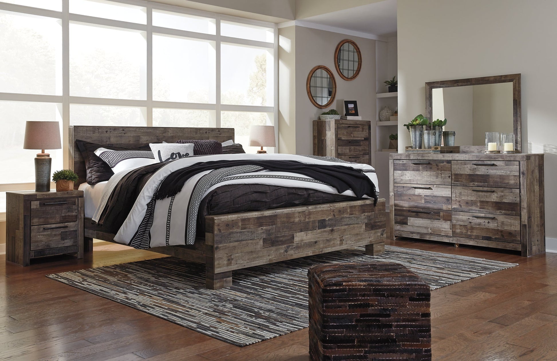 Derekson King Panel Bed with Mirrored Dresser, Chest and Nightstand Rent Wise Rent To Own Jacksonville, Florida