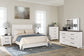 Gerridan Queen Panel Bed with Mirrored Dresser and Chest Rent Wise Rent To Own Jacksonville, Florida