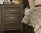 Juararo California King Panel Bed with Mirrored Dresser, Chest and 2 Nightstands Rent Wise Rent To Own Jacksonville, Florida