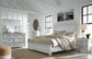 Kanwyn King Panel Bed with Mirrored Dresser, Chest and 2 Nightstands Rent Wise Rent To Own Jacksonville, Florida