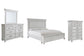 Kanwyn King Panel Bed with Storage with Mirrored Dresser and Chest Rent Wise Rent To Own Jacksonville, Florida