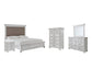 Kanwyn Queen Panel Bed with Mirrored Dresser, Chest and Nightstand Rent Wise Rent To Own Jacksonville, Florida