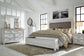 Kanwyn Queen Panel Bed with Storage with Mirrored Dresser and Chest Rent Wise Rent To Own Jacksonville, Florida