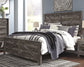 Wynnlow King Crossbuck Panel Bed with Mirrored Dresser, Chest and 2 Nightstands Rent Wise Rent To Own Jacksonville, Florida