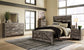 Wynnlow Queen Crossbuck Panel Bed with Mirrored Dresser and Chest Rent Wise Rent To Own Jacksonville, Florida
