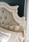 Realyn  Upholstered Panel Bed With Mirrored Dresser