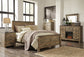 Trinell  Panel Bed With Dresser, Chest And Nightstand