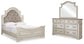 Realyn  Upholstered Panel Bed With Mirrored Dresser
