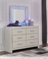 Zyniden  Upholstered Panel Headboard With Mirrored Dresser And Chest