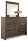 Juararo /California King Panel Headboard With Mirrored Dresser