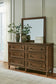 Sturlayne  Upholstered Panel Bed With Mirrored Dresser And Nightstand