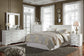 Anarasia  Sleigh Headboard, Dresser, Mirror, Chest And Nightstand