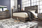 Drystan  Panel Bed, Dresser, Mirror, Chest And Nightstand