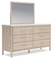 Cadmori  Upholstered Panel Bed With Mirrored Dresser
