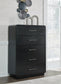 Rowanbeck  Upholstered Panel Bed, Dresser, Mirror, Chest And Nightstand