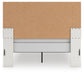 Zuraleus  Upholstered Panel Bed, Dresser And Mirror
